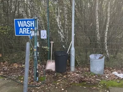 Wash area at a FedEx depot before installation of a Nilfisk 400HS DTE system. Existing setup prior to full pressure washer install and site modifications.